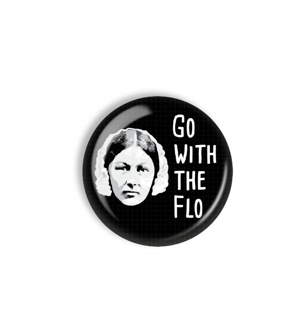 A black and white button with a portrait of a woman and the text "Go with the FLO" printed on it.