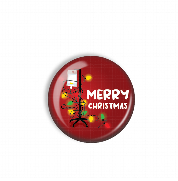 A red circular button with a Christmas tree design and the text "MERRY CHRISTMAS" written on it.