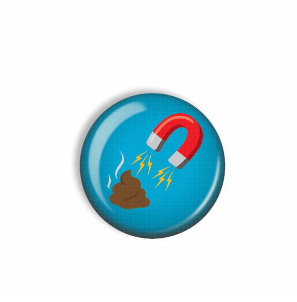 A blue button with a red magnet and a brown substance, possibly a piece of trash, on it.