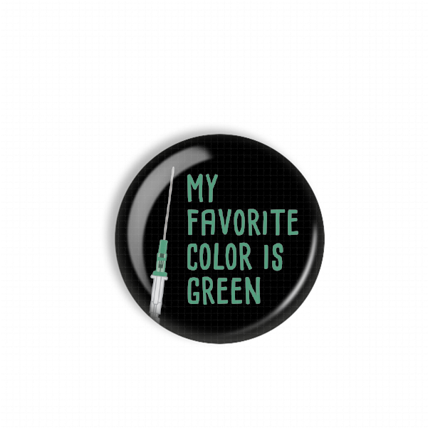 A black button with the text "MY FAVORITE COLOR IS GREEN" printed on it.