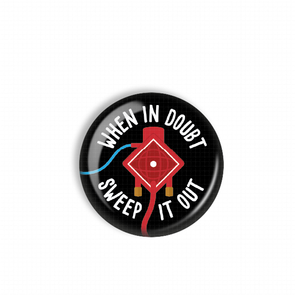 A black button with a red and white design, featuring the text "WHEN IN DOUBT SWEEP IT OUT" and a red kite-like shape.