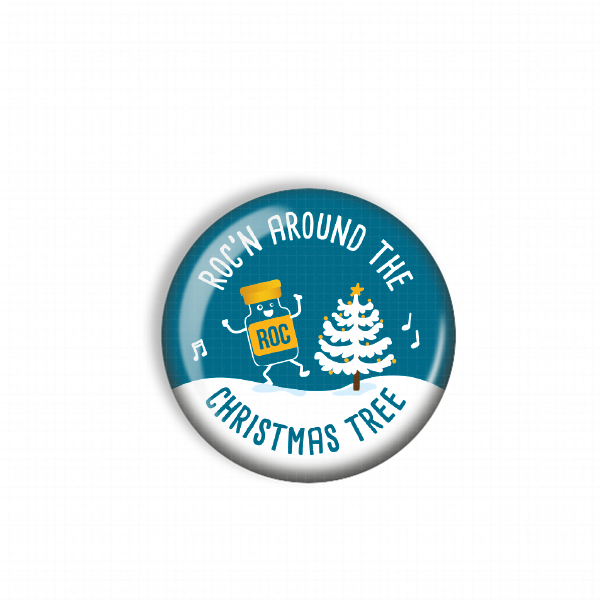 A blue circular button with a cartoon image of a peanut and a Christmas tree, along with the text "ROC'N AROUND THE CHRISTMAS TREE".