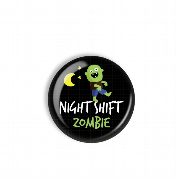 A black button with a cartoon zombie character and a crescent moon, along with the text "NIGHT SHIFT ZOMBIE" printed on it.