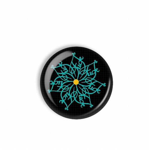 A black circular object with a blue and teal floral design on it.