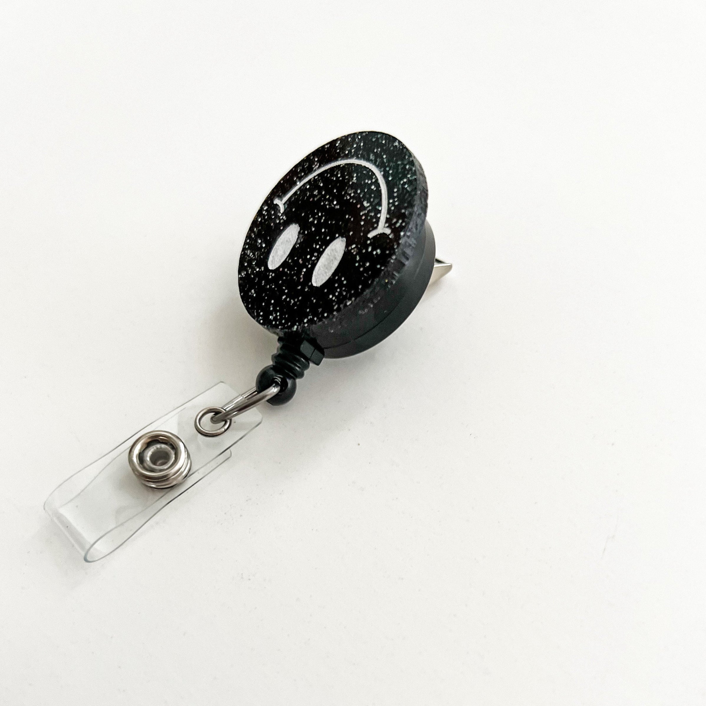 Glitter Badge Reel: Upside Down Smiley