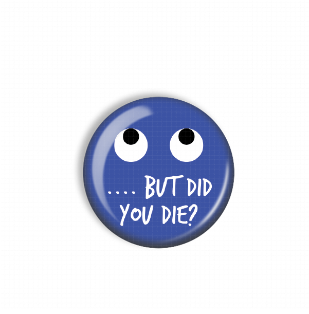 A blue button with a face design and text on it.