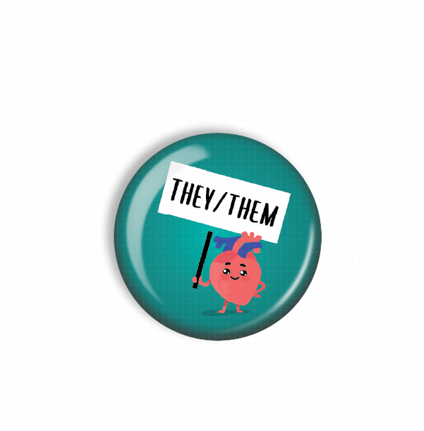A round button with a cartoon heart character holding a sign that says "THE/THEM".