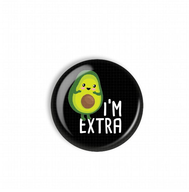 A black button with a cartoon avocado character and the text "I'M EXTRA" printed on it.