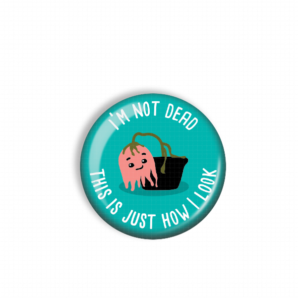 A blue button with a cartoon image of a pink jellyfish and the text "I'M NOT DEAD THIS IS JUST HOW I LOOK" printed on it.