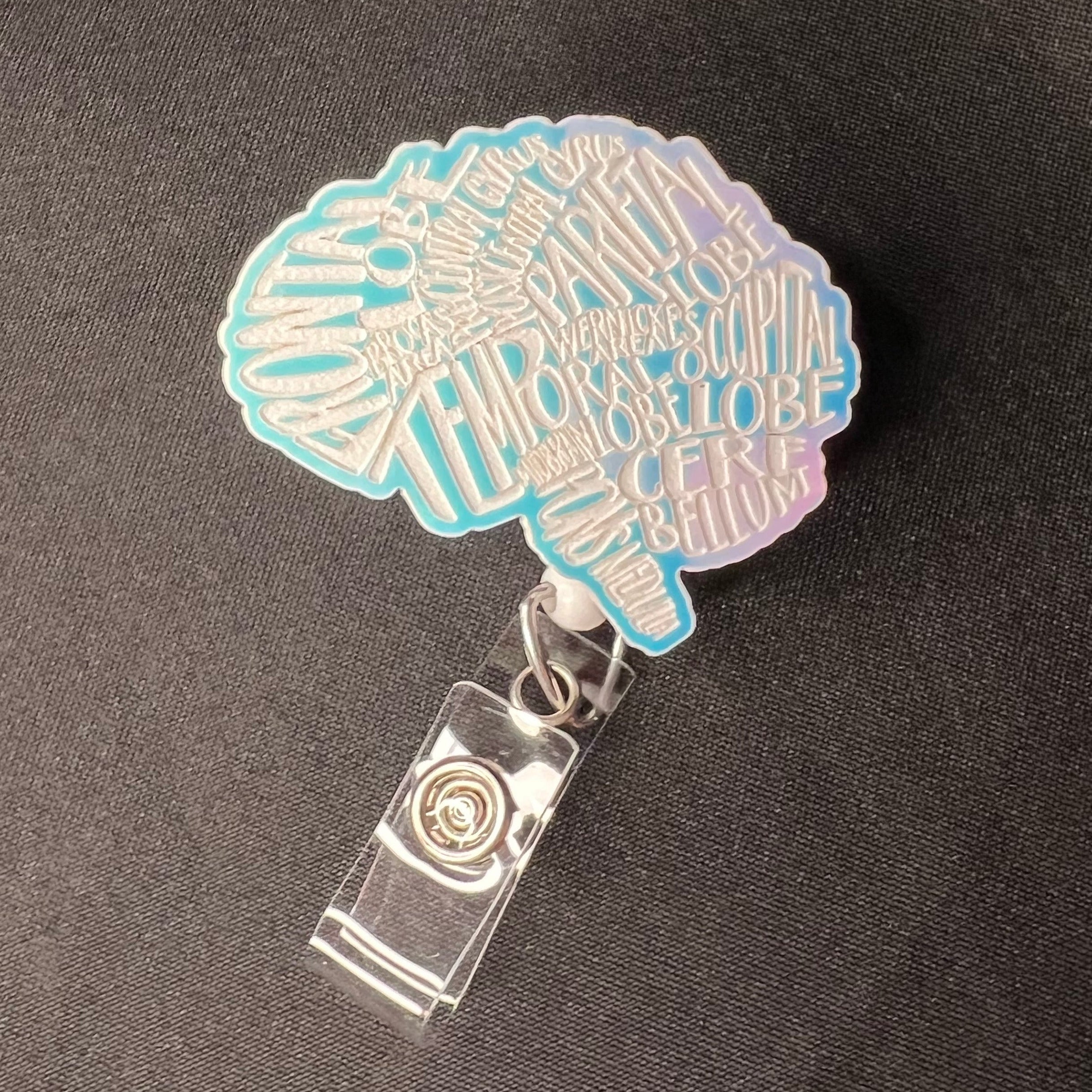 Color Shift Badge Reel Topper: Typographical Brain