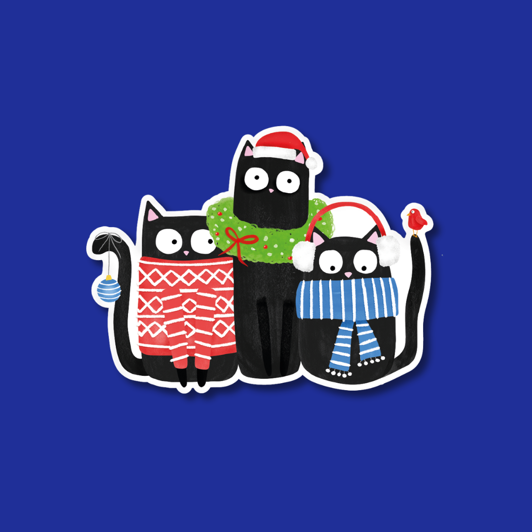 A group of three cats wearing festive clothing and accessories, including a Santa hat, scarf, and other holiday-themed items, against a blue background.