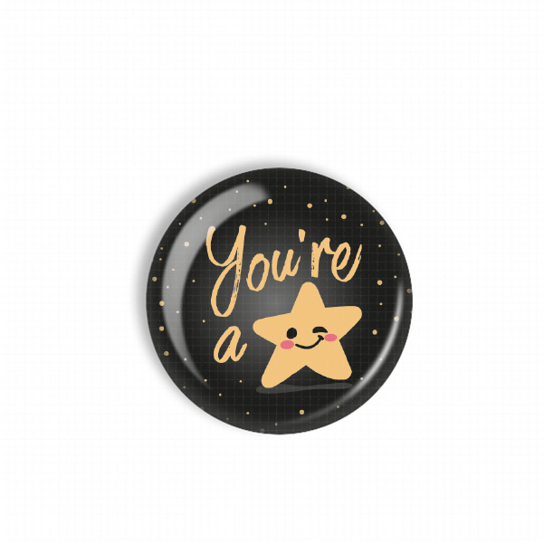 A black circular button with a yellow star and the text "You're a star" written on it.
