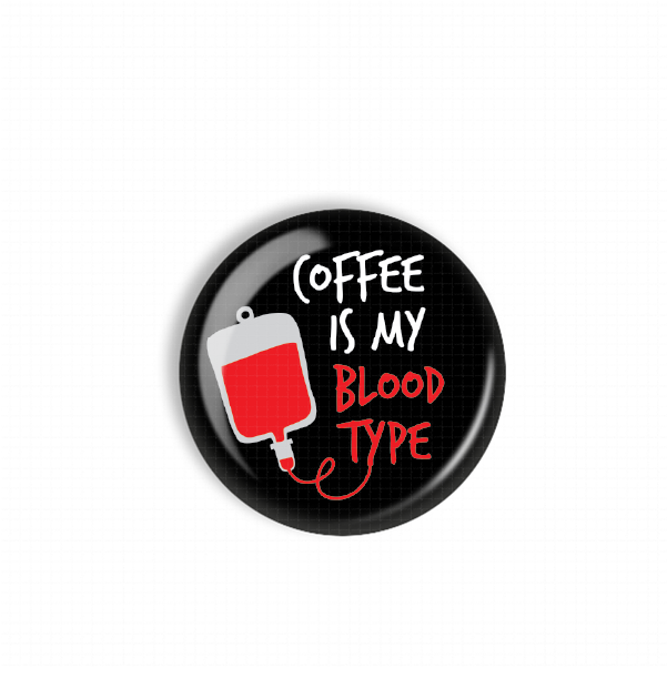 A black button with a red bag and the text "Coffee is my blood type" printed on it.