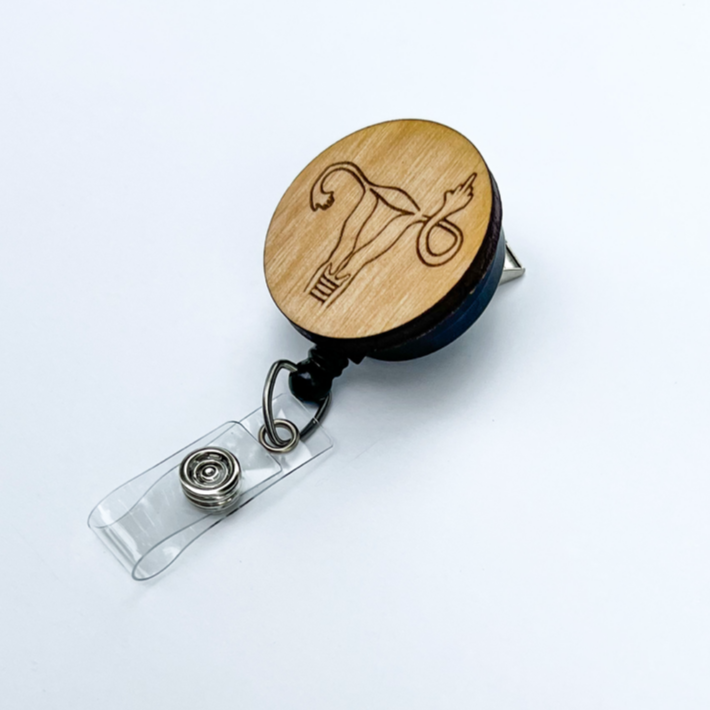 Wooden Badge Reel: Middle Finger Uterus
