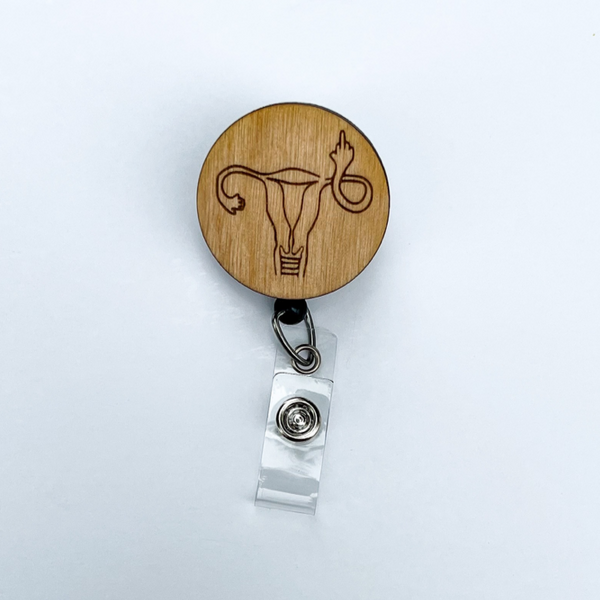 Wooden Badge Reel: Middle Finger Uterus